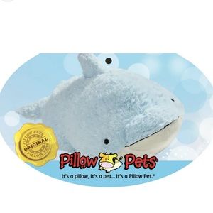 Dolphin Pillow Pet. Nicely used; in good condition.